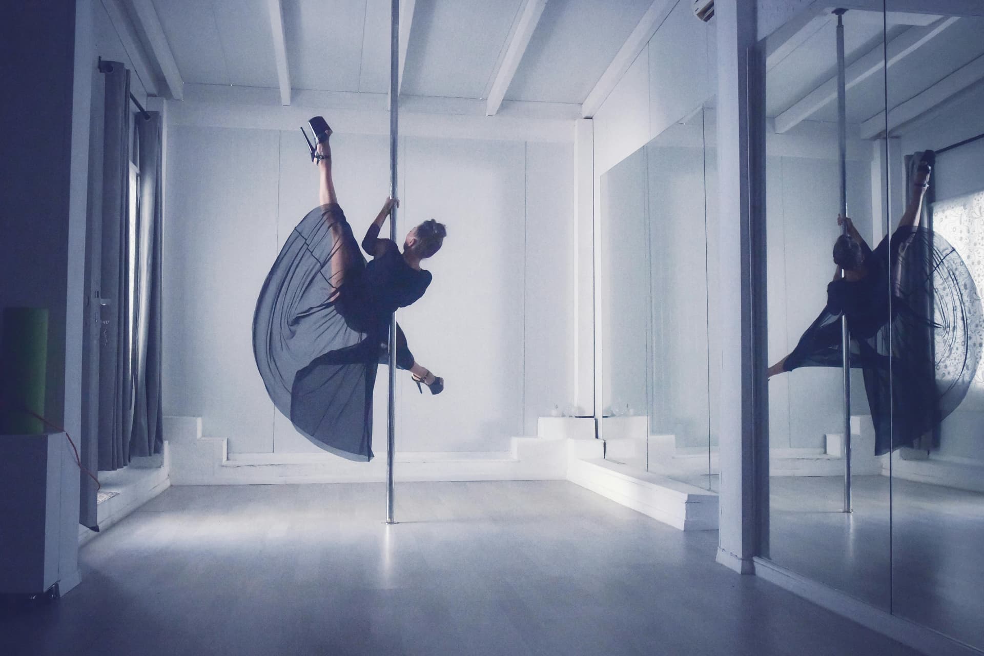 Pole studio interior, lit warm